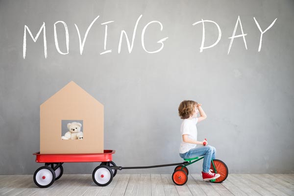 child moving into a new house after settlement